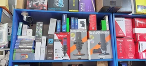 Фото товаров в магазине, мышки, клавиатуры и наушники - 