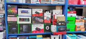 Фото товаров в магазине, мышки, клавиатуры и наушники - 